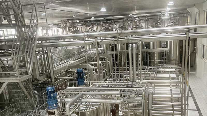 Technician Monitoring Production